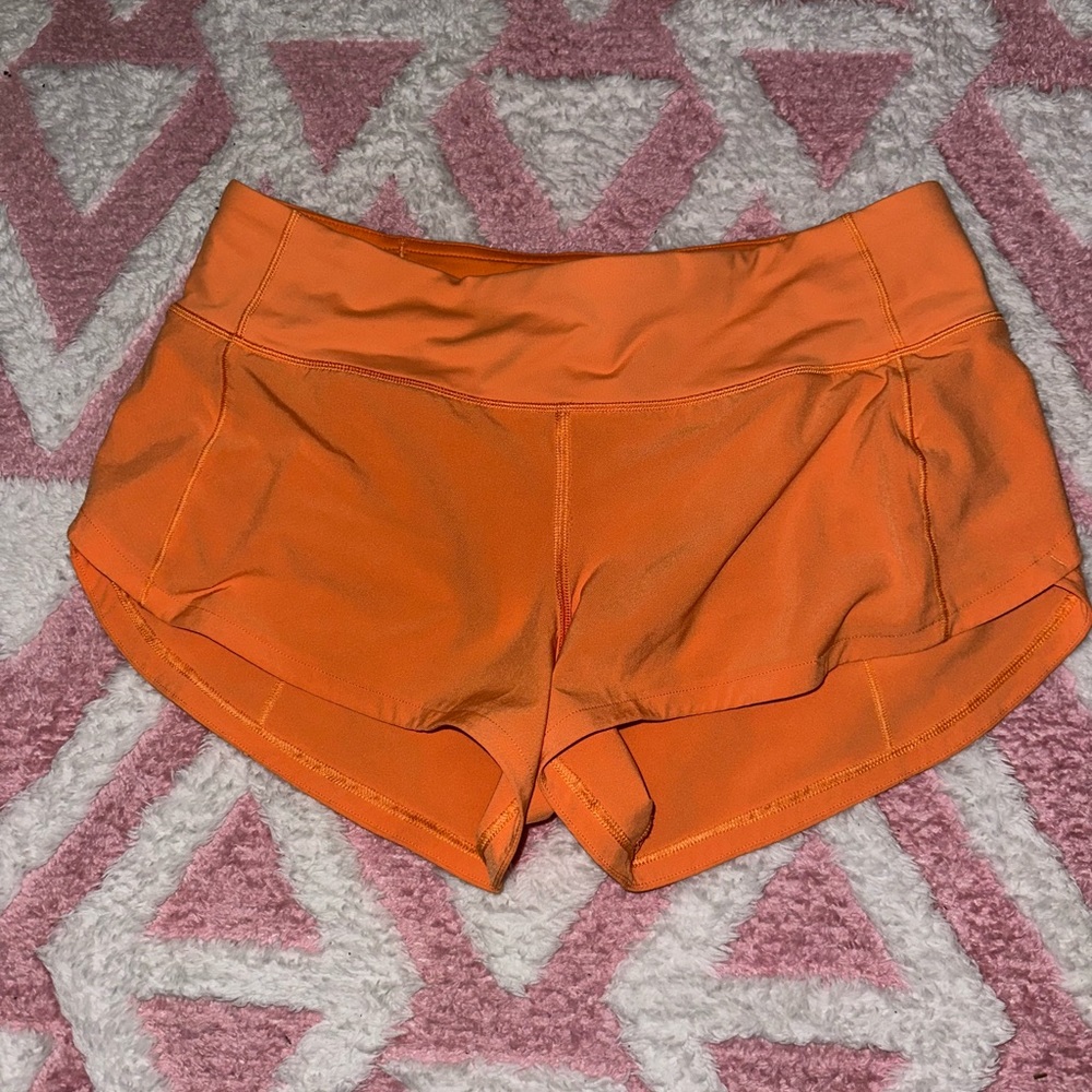 ORANGE SPEED UP SHORTS FROM LULULEMON! ALMOST BRAND NEW! SIZE 4 2.5 INCH
